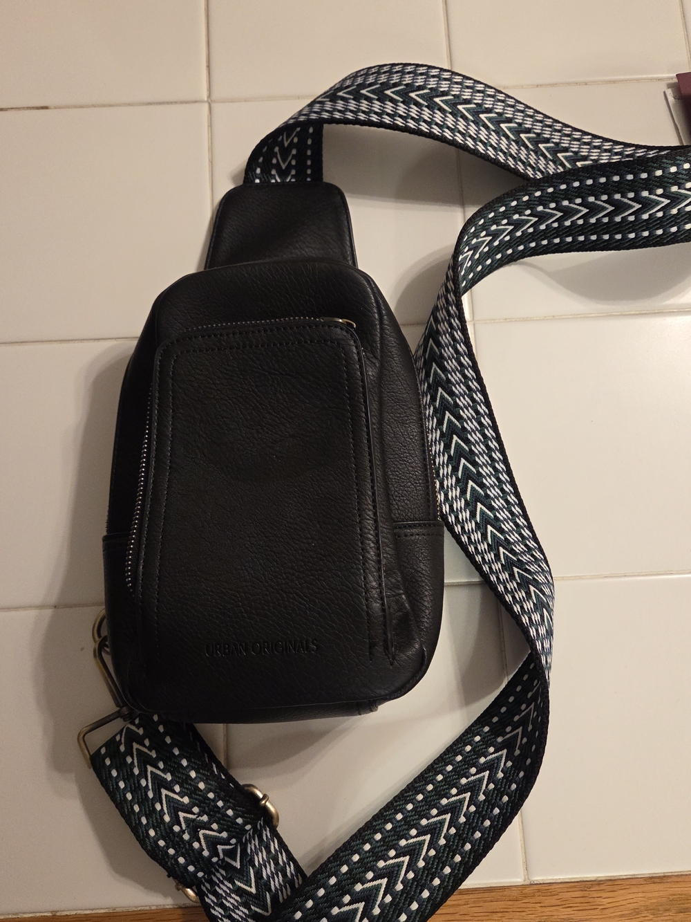 Urban Originals Black Leather Sling Bag with Patterned Strap